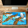 Wings over Waves Desk Mat