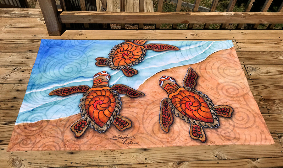 3 Baby Turtles Beach Towel