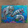 Manatees Cutting Board