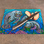 Manatees Cutting Board