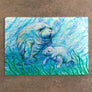Manatees in Grass Cutting Board
