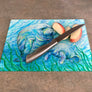 Manatees in Grass Cutting Board